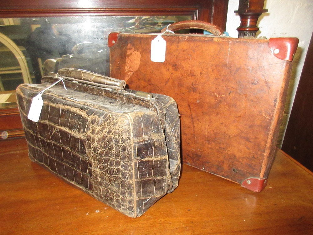 Quantity of various luggage including a vellum suitcase, smaller leather suitcases, Gladstone bag ( - Image 2 of 2
