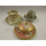 19th Century Minton's porcelain miniature covered saucepan and stand painted with flowers, within
