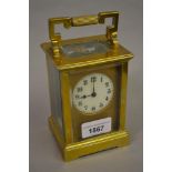 Early 20th Century brass cased carriage clock with enamel dial and single train movement