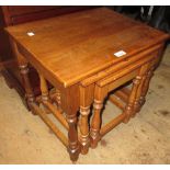 20th Century nest of rectangular oak tables on turned supports
