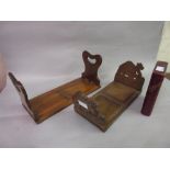 19th Century sliding book rack, a North African carved hardwood book rack and a leather photograph