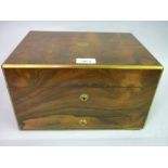 Victorian coromandel and brass bound dressing case, the hinged cover enclosing a fitted interior