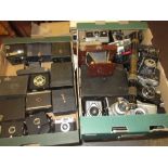 Collection of miscellaneous film cameras together with an early 20th Century black japanned brass