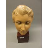 1920's French terracotta bust of a young woman, stamped TERRE CUITE D' ART, No. 1483, 16ins high