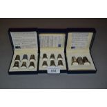 Cased set of six modern Battle of Trafalgar commemorative thimbles, similar cased set of six