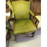 George III mahogany open armchair, the overstuffed back and seat covered in green striped fabric