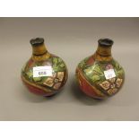 Pair of small Royal Bonn pottery vases decorated with an Art Nouveau design, 5.5ins high One has a