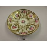 19th Century Nantgarw porcelain saucer painted with roses within gilt garlands and urns