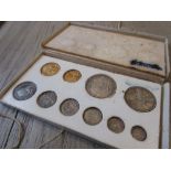 1911 Gold and silver coin set including sovereign and half sovereign and eight silver coins