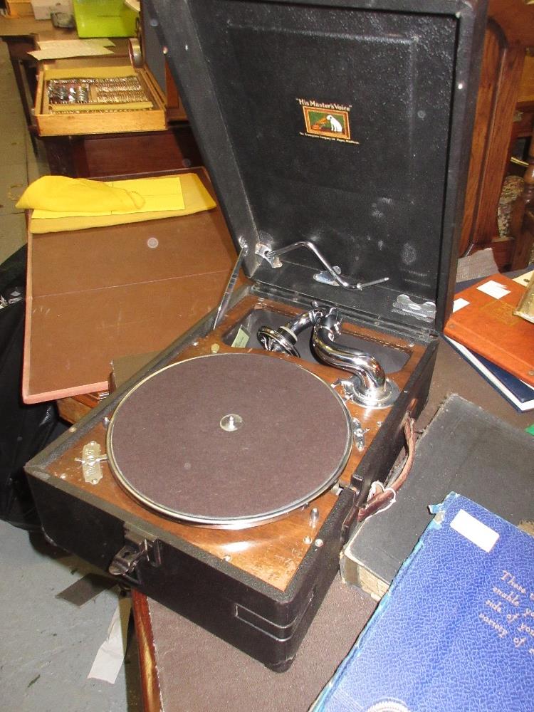 20th Century rexine cased H.M.V. wind-up table model gramophone, together with a small quantity of