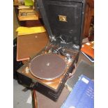 20th Century rexine cased H.M.V. wind-up table model gramophone, together with a small quantity of