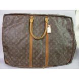 Louis Vuitton holdall with leather handles (at fault)