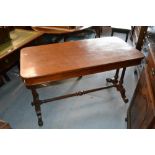 19th Century mahogany library table having plain top with moulded frieze, having two drawers bearing