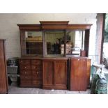 Large Victorian mahogany breakfront bookcase with a moulded cornice above open shelves (lacking