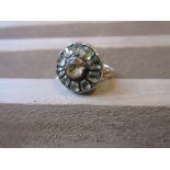9ct Yellow gold flower head cluster ring The shank is hallmarked Chester 1897, the setting shows