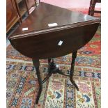 Small late Victorian mahogany clover leaf occasional table with three drop flaps on turned splay