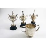 A MIXED LOT:- Three small early 20th century golfing trophy cups & covers (two with golfer figure