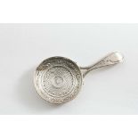A GEORGE III "STAMPED" CADDY SPOON with a bifurcated handle & resembling a shallow frying pan, by