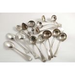 A MIXED LOT:- Three George II / III table spoons (one crested, two initialled), a George III sugar