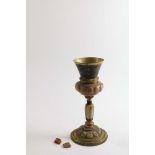 A 17TH CENTURY CONTINENTAL GILT-METAL MOUNTED AMBER GOBLET with lobed & fluted decoration and a