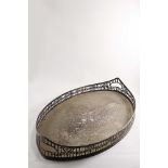 A LATE VICTORIAN ELECTROPLATED TWO HANDLED TRAY with a fret-pierced gallery and a navette-shaped