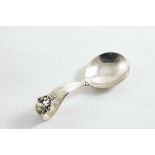 A 20TH CENTURY DANISH ACORN PATTERN PATTERN CHILD'S SPOON with a loop handle, by Georg Jensen,