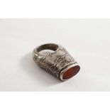 A 19TH CENTURY MIDDLE EASTERN RING set with an oval hardstone seal with intaglio script and a