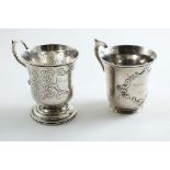 TWO MID-19TH CENTURY AMERICAN CHRISTENING MUGS with campana-shaped bowls: one with a circular