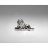 A GEORGE III SMALL NOVELTY SILVER SNUFF BOX in the form of a recumbent lion, with a hinged base &