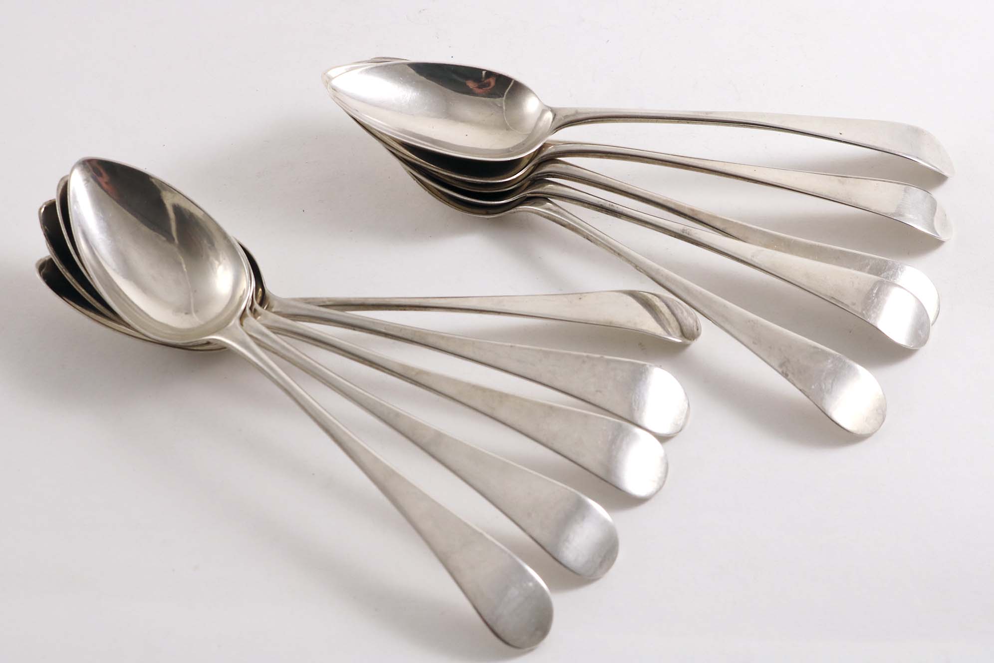 A SET OF TEN GEORGE III WEST COUNTRY DESSERT SPOONS Old English pattern, by Richard Jenkins, Exeter,