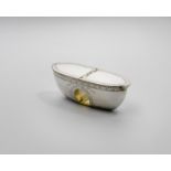 A GEORGE III SILVER "THUMBHOLE" SNUFF BOX boat-shaped with engraved borders, dual compartments &