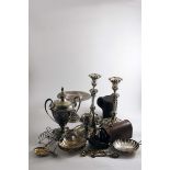 PLATED WARE:- A pair of Victorian candlesticks combined as a tazza by Elkington & Co., an Old