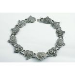 A LATE 19TH / EARLY 20TH CENTURY CHINESE NECKLACE made up of twelve shaped and linked panels, each