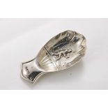 AN EARLY 20TH CENTURY "STAMPED" CADDY SPOON with a tea planter in the bhowl, by T. Bradbury &