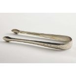 IRISH PROVINCIAL:- A pair of George III bright-cut sugar tongs, initialled, by John Nicholson of