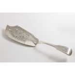A GEORGE IV FISH SLICE Fiddle pattern with pierced & engraved decoration and a stylised dolphin on