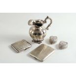 A MIXED LOT:- A Dutch cream jug, a Continental cigarette case, two small decorative heart-shaped