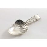 A GEORGE III ENGRAVED CADDY SPOON with an acorn-shaped bowl, by Elizabeth Morley, London 1808; 3.25"