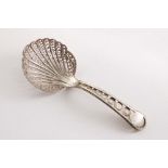 A GEORGE III FILIGREE CADDY SPOON with an initialled oval cartouche at the top of the stem,