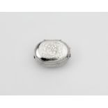 A CHARLES II OVAL SILVER SPICE BOX with engraved decoration and "squeeze" sides, the cover with a