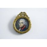 GERMAN SCHOOL c.1800 Portrait of an officer with powdered hair wearing uniform, on ivory; 2.75 cms