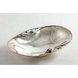 A SMALL COLLECTION OF PIECES BY GEORG JENSEN OF COPENHAGEN:- An early 20th century Danish dish of
