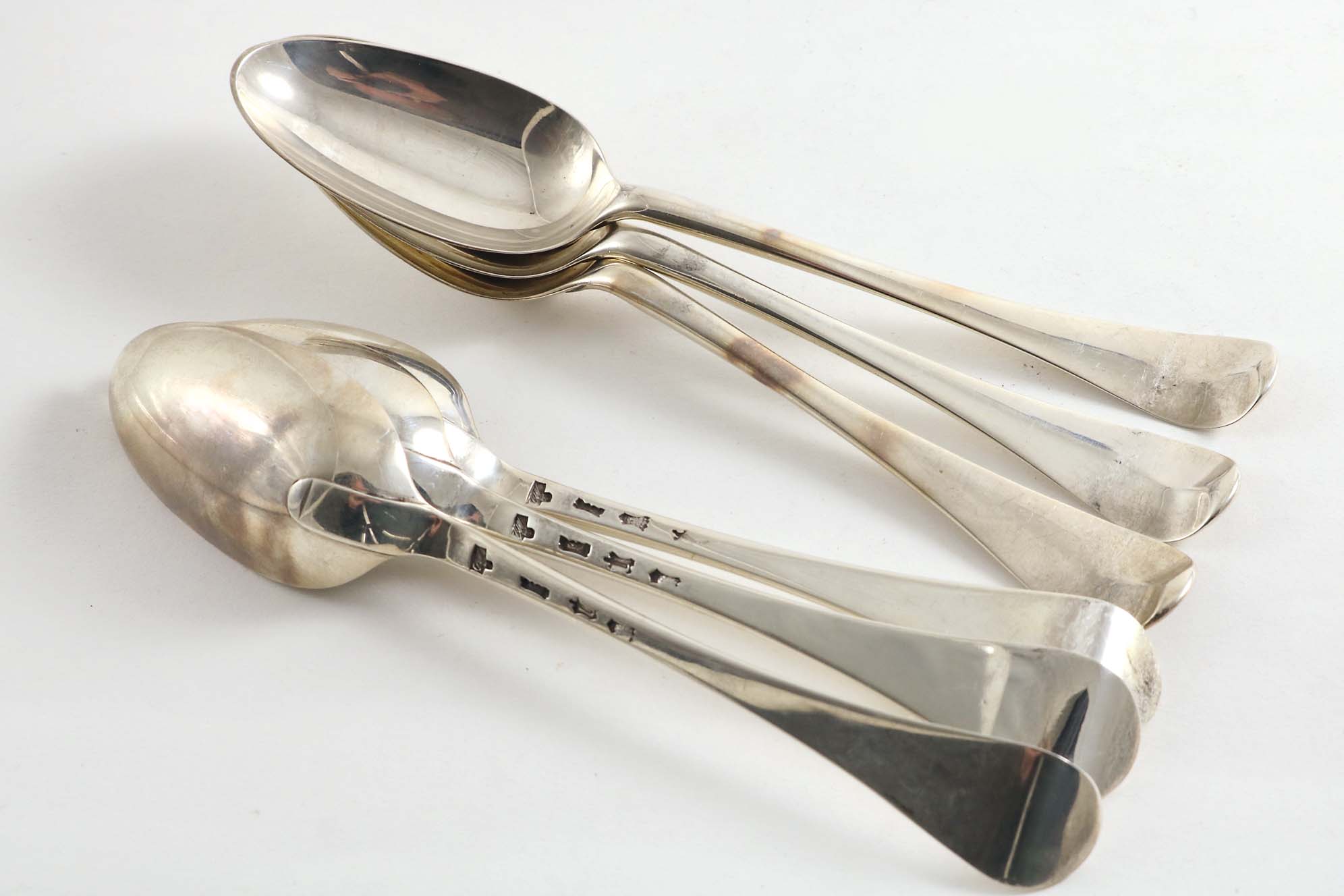 A SET OF SIX GEORGE II HANOVERIAN PATTERN TABLE SPOONS by Marmaduke Daintry, London 1748; 13.2 oz (