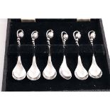 A SET OF SIX EARLY 20TH CENTURY DANISH BLOSSOM PATTERN COFFEE SPOONS by Georg Jensen, Copenhagen,