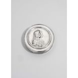 A LATE 17TH / EARLY 18TH CENTURY SILVER SNUFF BOX circular with a pull-off cover, inset with a