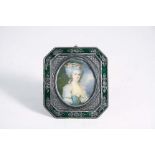 FRENCH SCHOOL c.1900 A miniature portrait of a lady with flowers in her hair, half length on
