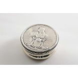 A GEORGE I SILVER SNUFF BOX circular with moulded sides and reeded borders, the pull-off cover