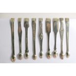 EXETER:- Nine various pairs of Exeter-made sugar tongs, George III-George IV period (most with