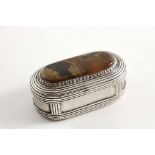 A GEORGE IV SNUFF BOX of rounded rectangular form with an agate-set cover, reeded borders and