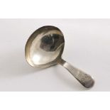 A GEORGE III PROVINCIAL CADDY SPOON with an oval bowl, initialled, by Edward Jackson of York c.